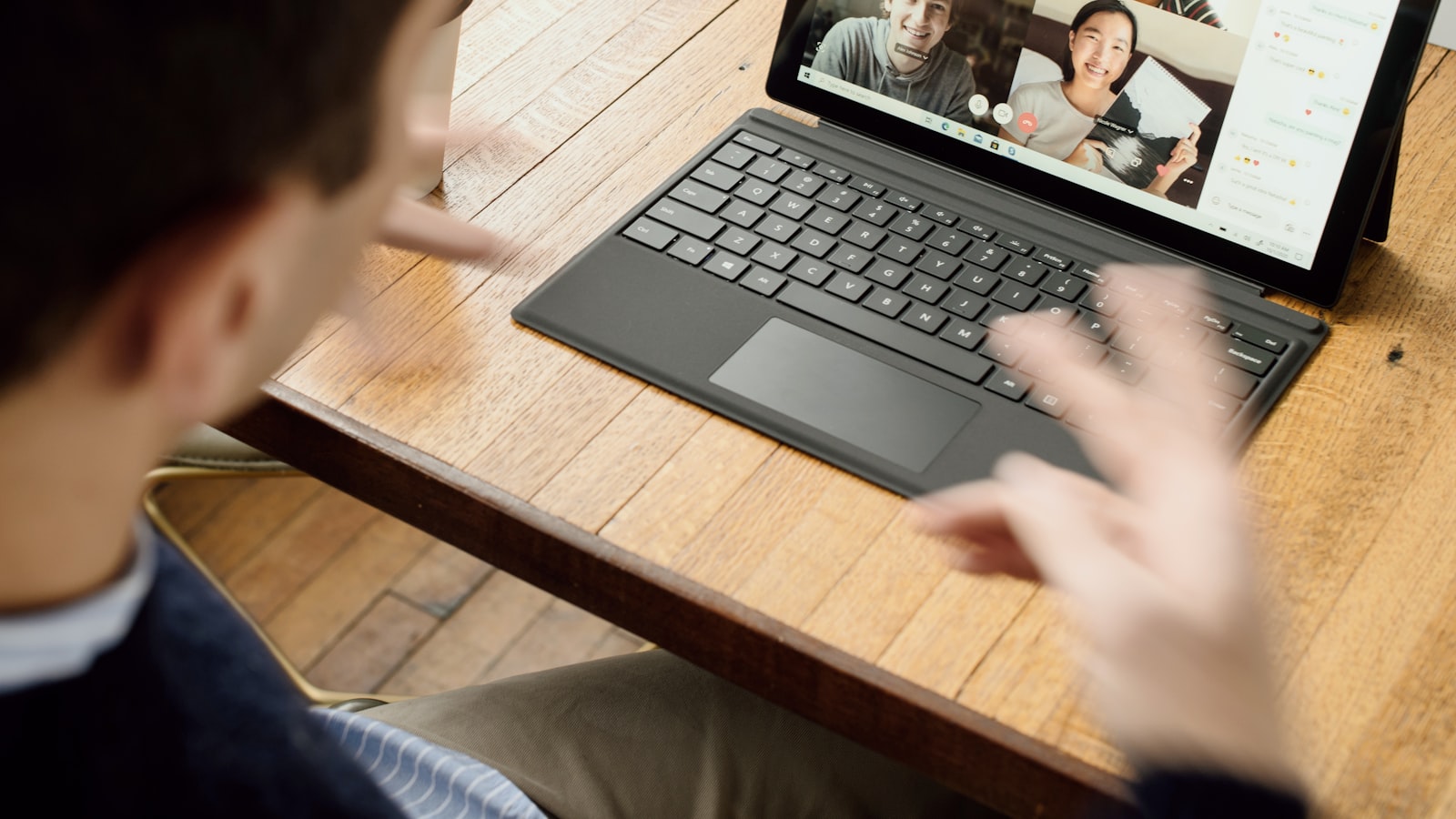 A laptop showing a simple line chart on a tidy desk